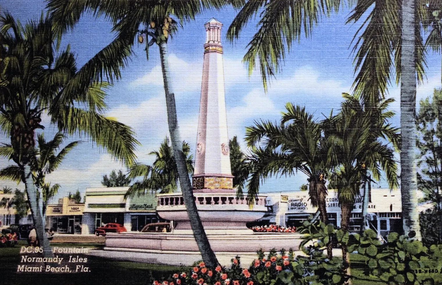 Historic Normandy Isles fountain surrounded by palms